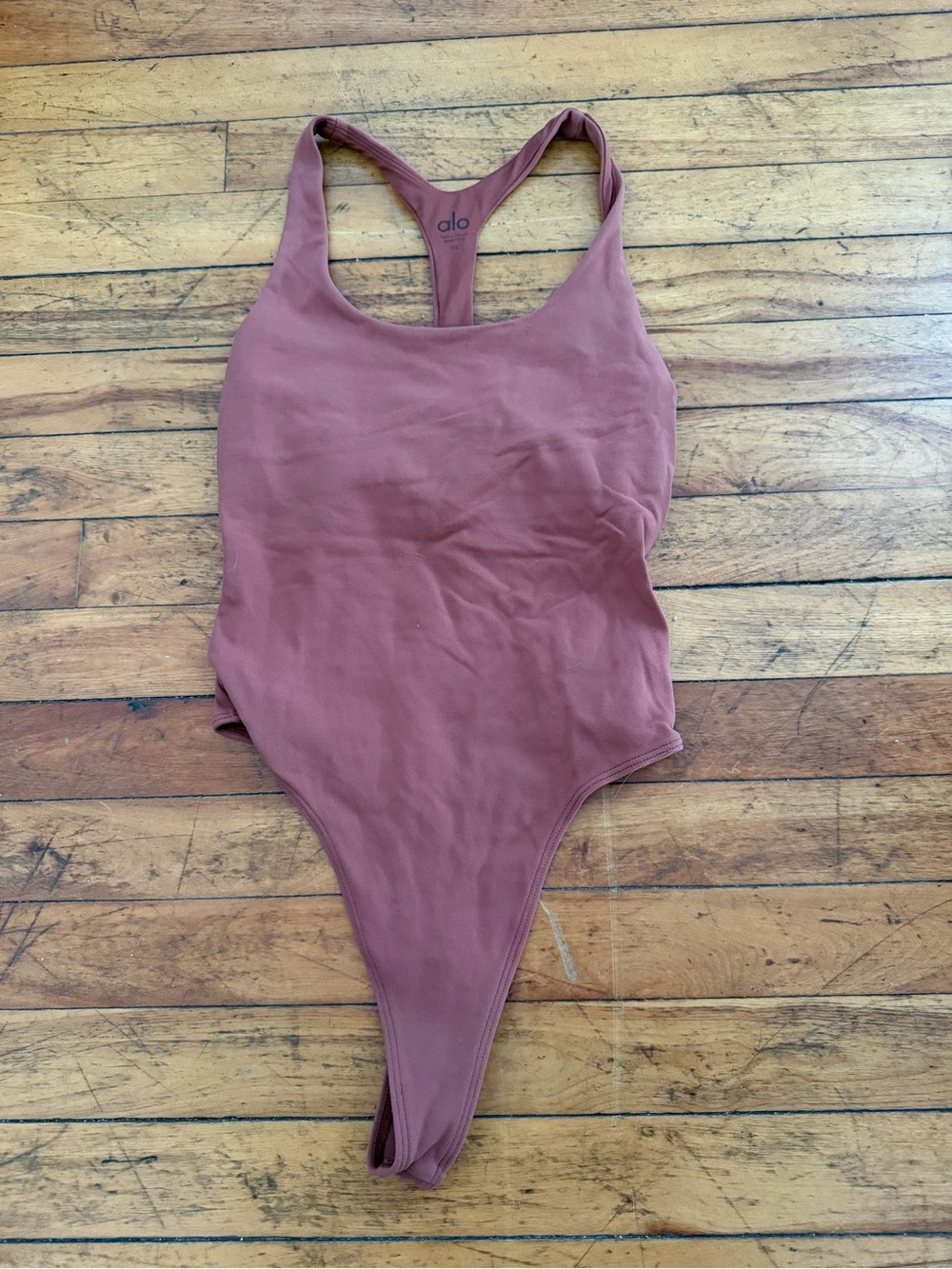 ALO Yog Dusty Mauve One-Piece bodysuit